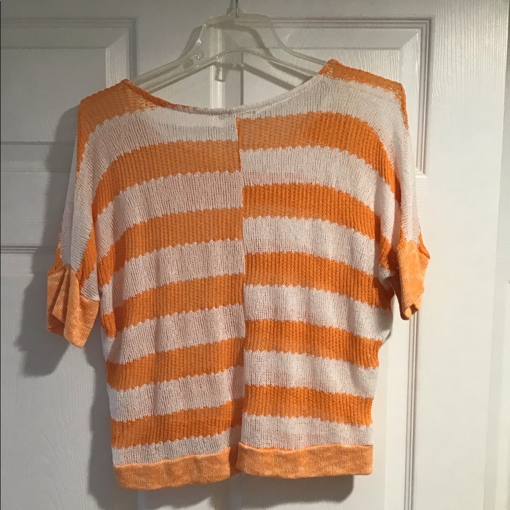 Orange and white top